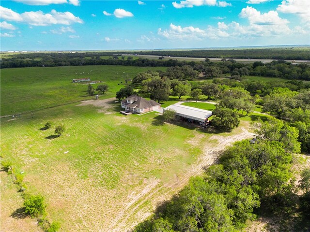 birds eye view of property with a rural view