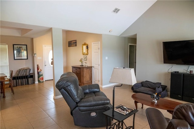 2562 Big Oak Ln, Ingleside, TX 78362 - living area featuring light tile patterned floors, baseboards, and high vaulted ceiling
