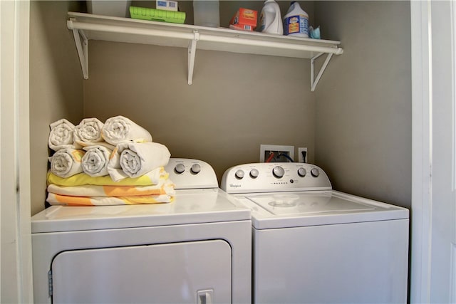 laundry room featuring washer and clothes dryer