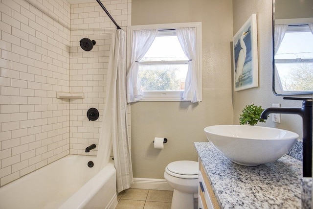 full bathroom featuring vanity, tile patterned flooring, toilet, and shower / tub combo with curtain