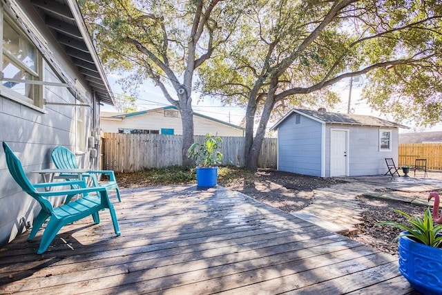 wooden terrace with a storage unit