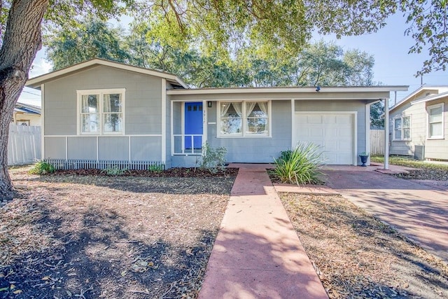 single story home with a garage