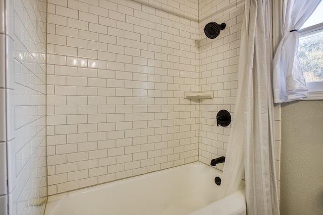 bathroom featuring shower / bath combo