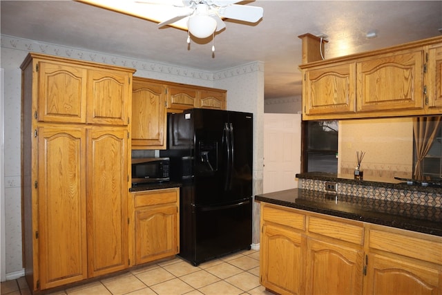 kitchen featuring black refrigerator with ice dispenser, light tile patterned floors, and ceiling fan