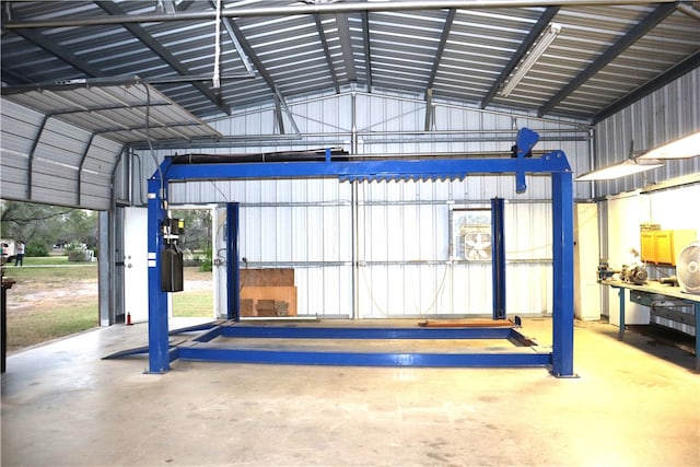 garage with a carport