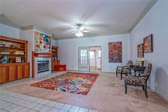 14613 Powell Dr, Corpus Christi, TX 78410 - living area featuring ornamental molding, light colored carpet, ceiling fan, a fireplace, and a textured ceiling