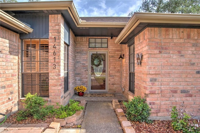 14613 Powell Dr, Corpus Christi, TX 78410 - property entrance with brick siding and board and batten siding