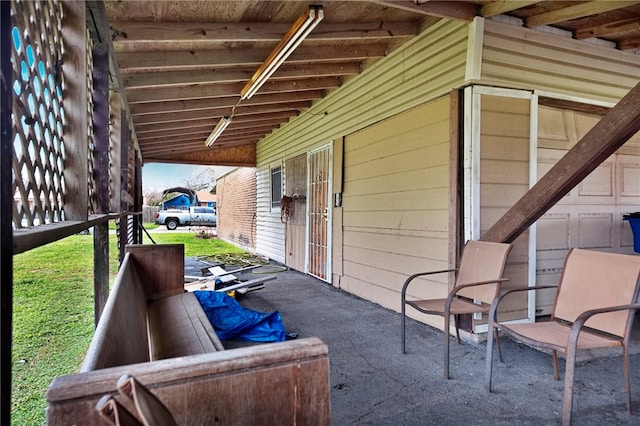 view of patio with a garage