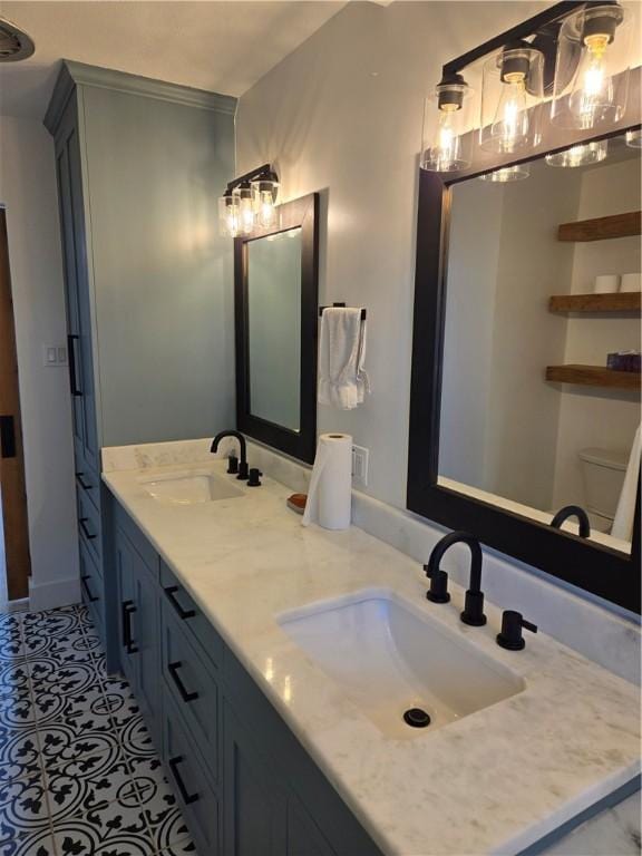 bathroom featuring vanity and tile patterned flooring