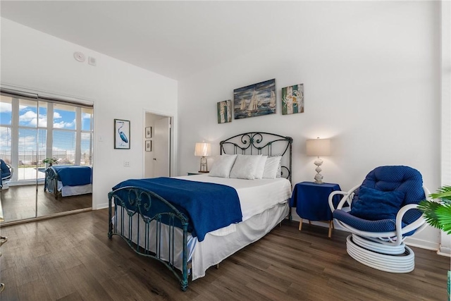 bedroom featuring dark hardwood / wood-style floors