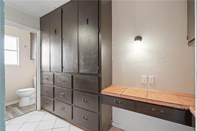 1318 W Cherrystone Dr, Corpus Christi, TX 78412 - bathroom with toilet and tile patterned floors