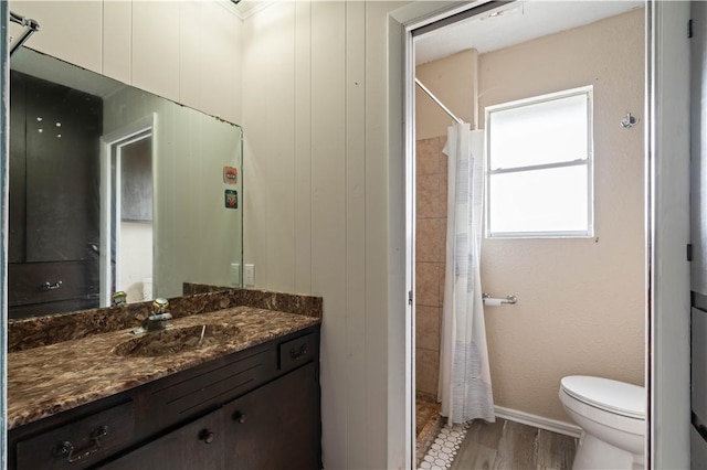 1318 W Cherrystone Dr, Corpus Christi, TX 78412 - bathroom featuring vanity, curtained shower, and wood finished floors