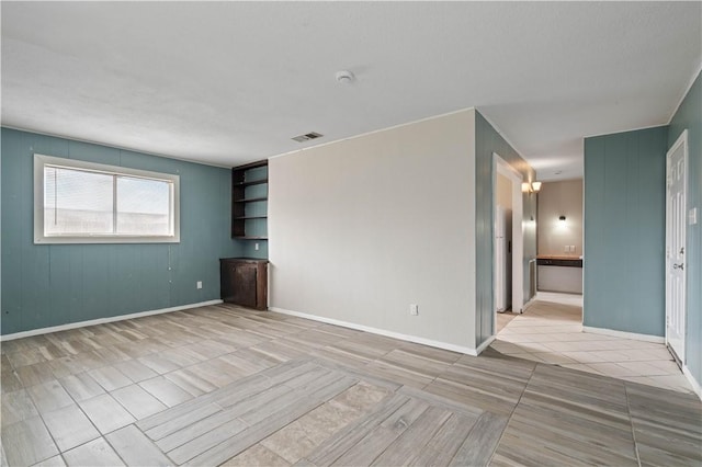 1318 W Cherrystone Dr, Corpus Christi, TX 78412 - spare room featuring light tile patterned flooring and a smoke detector