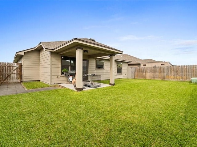 7717 Pruet Dr, Corpus Christi, TX 78414 - back of property featuring a fenced backyard and a patio area