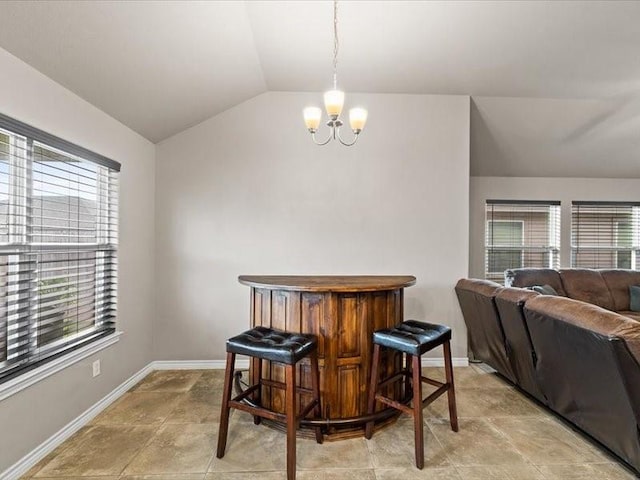 7717 Pruet Dr, Corpus Christi, TX 78414 - dining room with lofted ceiling, a chandelier, and healthy amount of natural light