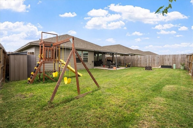 2673 Abbey Rd, Corpus Christi, TX 78415 - view of yard with a patio and a playground