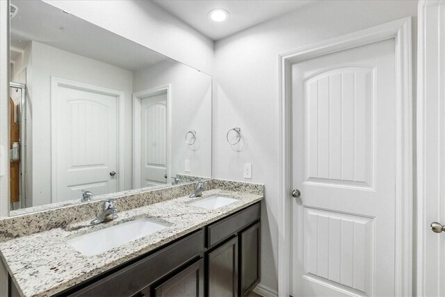 2673 Abbey Rd, Corpus Christi, TX 78415 - bathroom featuring double vanity