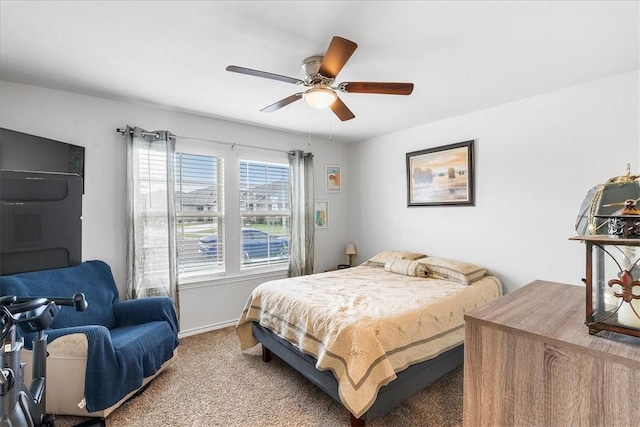 2673 Abbey Rd, Corpus Christi, TX 78415 - carpeted bedroom featuring baseboards and a ceiling fan