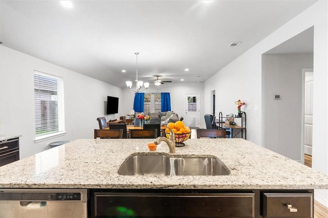 2673 Abbey Rd, Corpus Christi, TX 78415 - kitchen with a sink, dishwasher, open floor plan, recessed lighting, and an island with sink