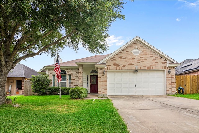 ranch-style house featuring a garage and a front lawn