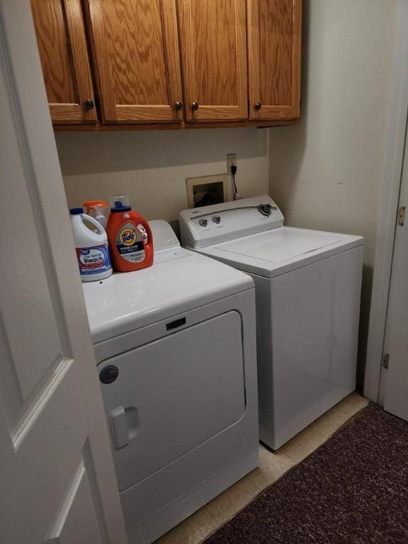 2292 N Fulton Beach Rd, Rockport, TX 78382 - laundry area with washing machine and dryer and cabinet space