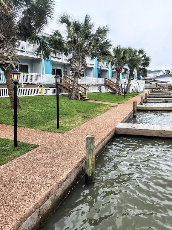 2292 N Fulton Beach Rd, Rockport, TX 78382 - dock area with a water view and a yard