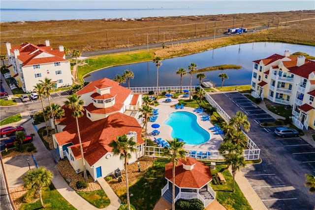 bird's eye view with a water view