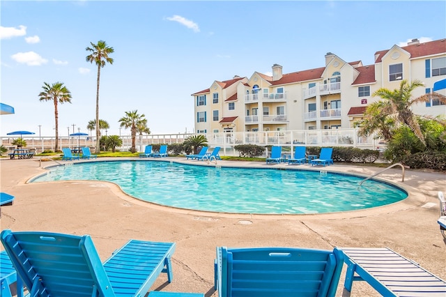 view of pool with a patio