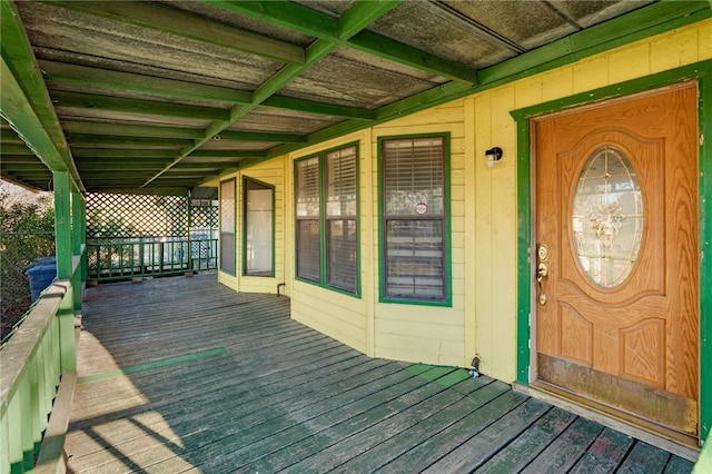 wooden terrace featuring a porch