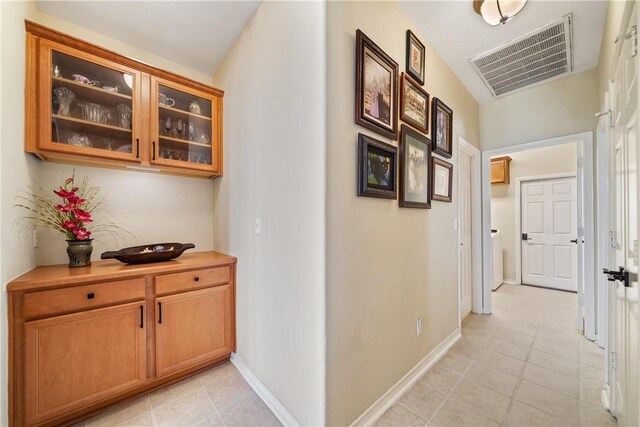 6217 Garden Ct, Corpus Christi, TX 78414 - hall featuring light tile patterned floors and baseboards