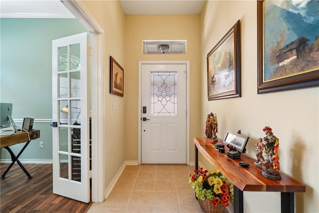 6217 Garden Ct, Corpus Christi, TX 78414 - entryway with baseboards and light wood finished floors