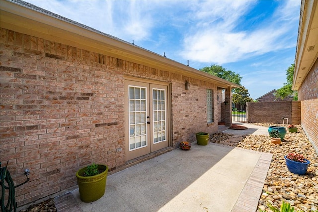 6217 Garden Ct, Corpus Christi, TX 78414 - view of patio featuring french doors and fence