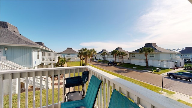 balcony featuring a residential view