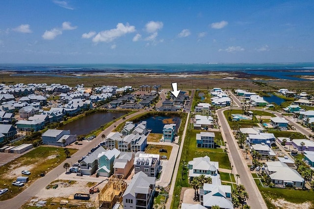 aerial view featuring a water view and a residential view