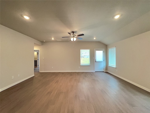 3014 Stone Creek Dr, Corpus Christi, TX 78410 - unfurnished room featuring dark wood-type flooring, baseboards, a ceiling fan, recessed lighting, and lofted ceiling