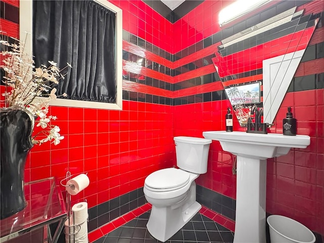 130 Alta Plz, Corpus Christi, TX 78411 - half bathroom with tile walls, tile patterned floors, and toilet