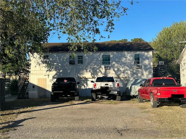 view of property exterior featuring a garage