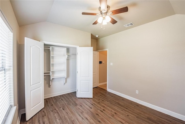 4384 Summer Wind Dr, Corpus Christi, TX 78413 - unfurnished bedroom featuring vaulted ceiling, wood finished floors, a closet, and ceiling fan