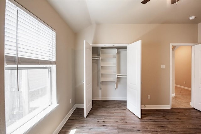 4384 Summer Wind Dr, Corpus Christi, TX 78413 - unfurnished bedroom featuring wood finished floors, lofted ceiling, a closet, and ceiling fan