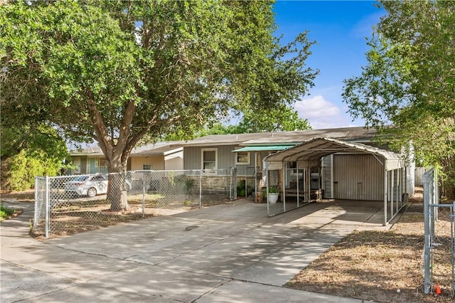 1006 Vernon Dr, Corpus Christi, TX 78407 - view of front of home featuring a carport and concrete driveway
