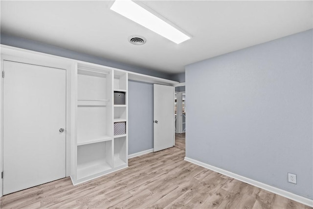 1006 Vernon Dr, Corpus Christi, TX 78407 - unfurnished bedroom with wood finished floors and baseboards