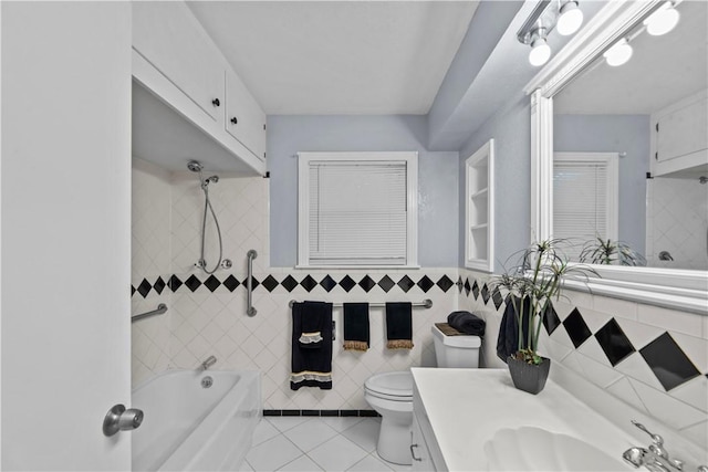 1006 Vernon Dr, Corpus Christi, TX 78407 - bathroom with tile patterned flooring, toilet,  shower combination, vanity, and tile walls