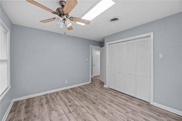 1006 Vernon Dr, Corpus Christi, TX 78407 - unfurnished bedroom with wood finished floors, a closet, and baseboards