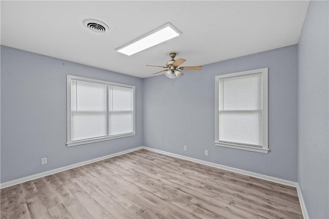 1006 Vernon Dr, Corpus Christi, TX 78407 - empty room featuring wood finished floors, ceiling fan, and baseboards