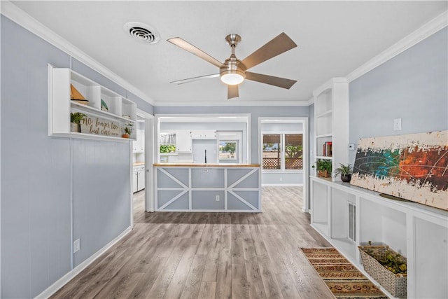 1006 Vernon Dr, Corpus Christi, TX 78407 - bar with light wood finished floors, ceiling fan, crown molding, and baseboards