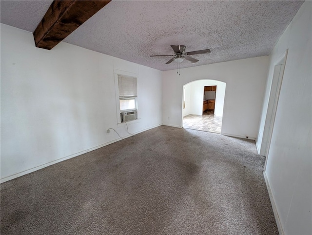unfurnished room featuring a ceiling fan, arched walkways, carpet, a textured ceiling, and cooling unit