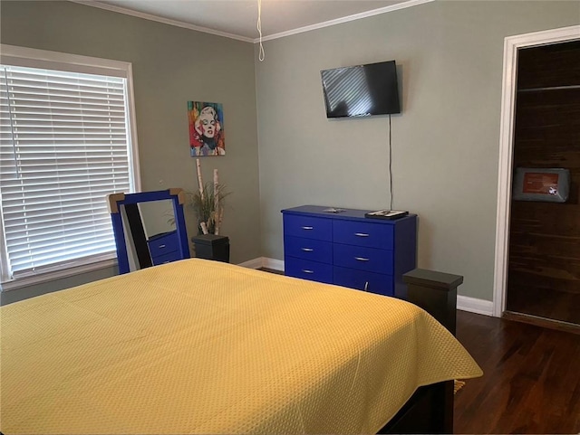 438 Indiana Ave, Corpus Christi, TX 78404 - bedroom featuring dark wood-type flooring, baseboards, and ornamental molding