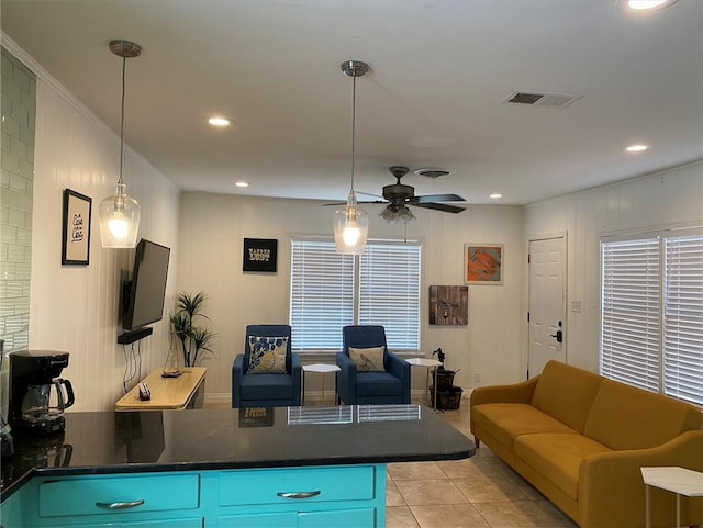 438 Indiana Ave, Corpus Christi, TX 78404 - living room featuring ceiling fan, light tile patterned floors, and recessed lighting