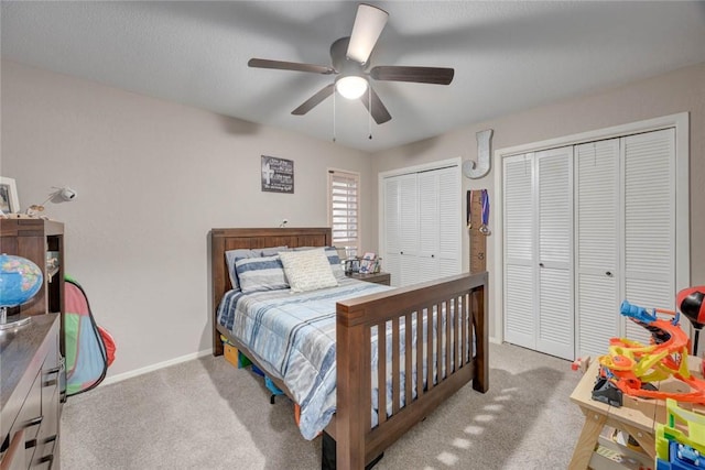 108 Lost Creek Dr, Portland, TX 78374 - carpeted bedroom with multiple closets, baseboards, and a ceiling fan