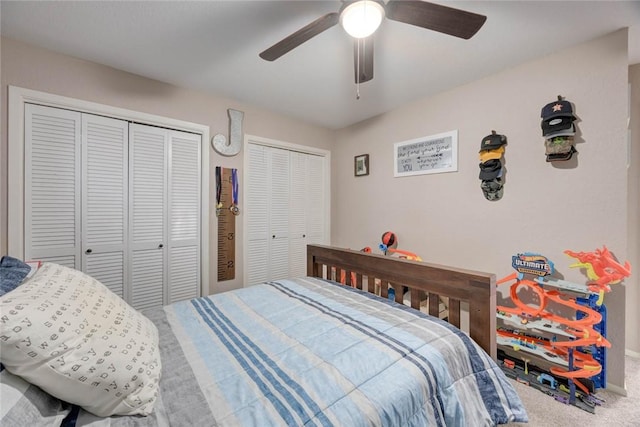 108 Lost Creek Dr, Portland, TX 78374 - bedroom with multiple closets, carpet floors, and a ceiling fan